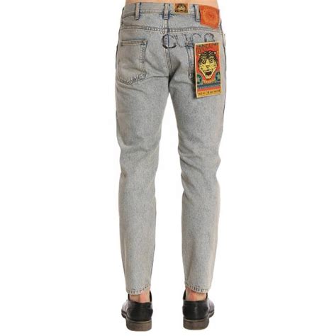 pantaloni gucci jeans uomo con toppe|gucci tapered jeans.